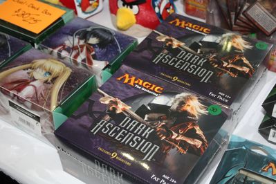 Trading Cards.
Magic Trading cards, and some others to the left I can't identify.
Keywords: AX2012